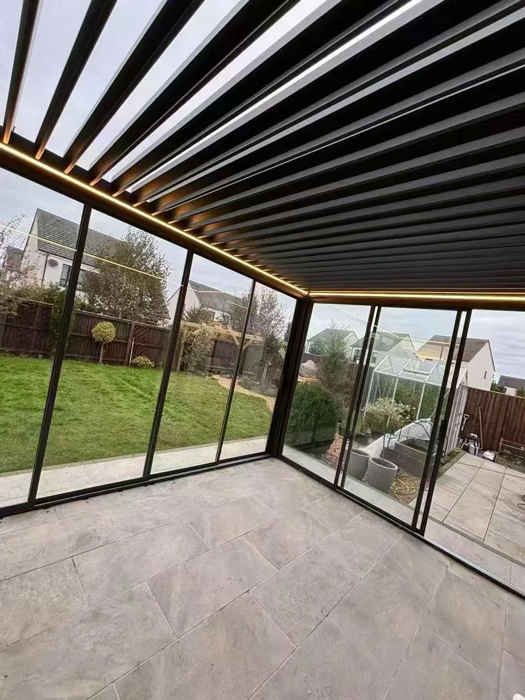 Slim frame glass outdoor room enclosure
