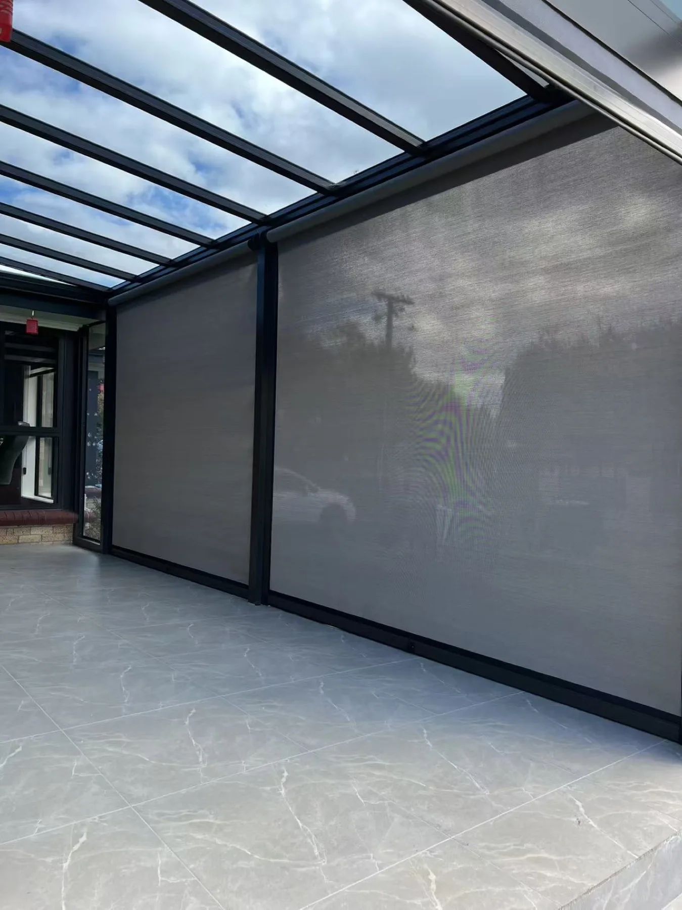 Ziptrak outdoor blind enclosure